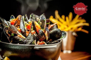 1458670690mussels_and_fries_at_camelot_restaurant.jpg